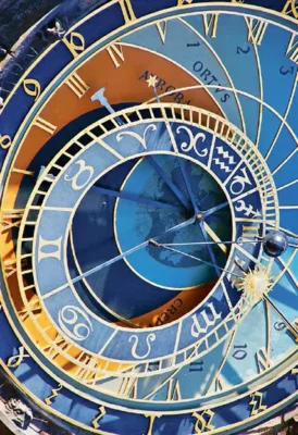 The astronomical clock in the town square of Prague, Czech Republic. Analog clocks like this, which tracked hours, minutes, and the motions of the Sun and Moon, have been replaced in scientific research by precise digital clocks and an internationally regulated system of timekeeping.