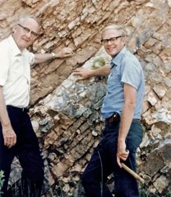 In 1981, Luis (left) and Walter Alvarez collected samples of layered sedimentary rocks in Gubbio, Italy, at the 65-million-year-old boundary between the Cretaceous (lower) and Paleogene (upper, formerly called Tertiary) geologic time periods.