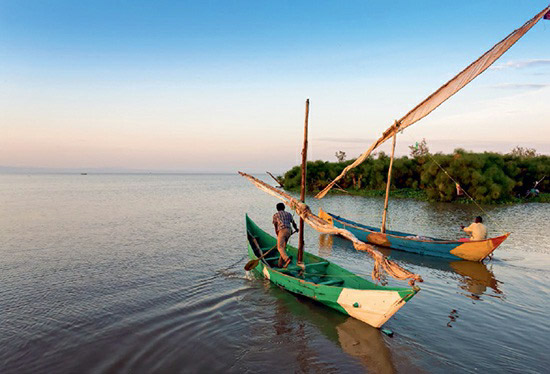 Fishermen setting out for their daily work along the shores of Lake Victoria in Uganda
