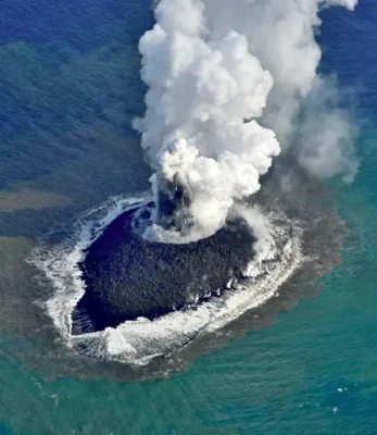 A 2013 photo of an erupting undersea volcano creating a new island off the coast of Nishinoshima, Japan. The future Hawaiian island of Loihi will resemble this in geological terms.