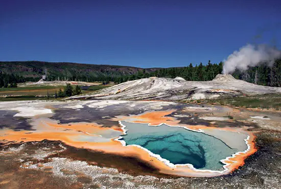 Vividly colored mineral deposits from hot springs at Lion Geyser and Heart Spring in Yellowstone National Park.