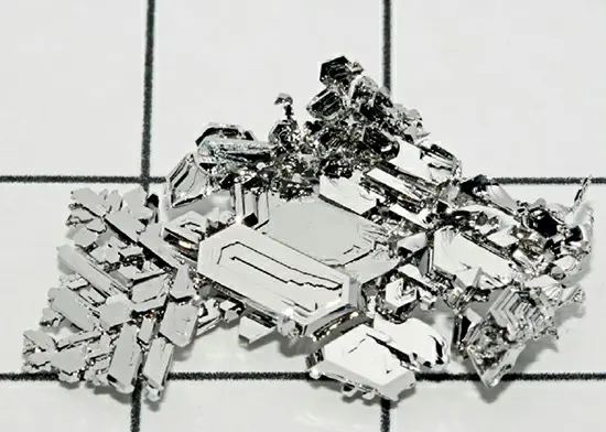 Laboratory-grown pure platinum crystals, approximately 1 inch (2.5 cm) in size.