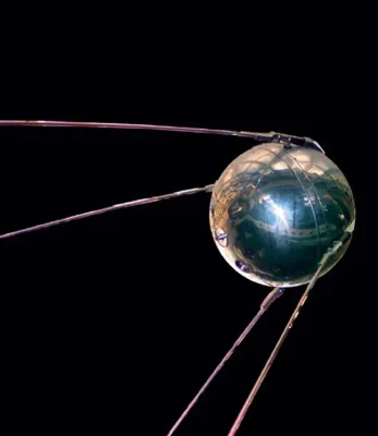A replica of Sputnik 1, the world's first artificial space satellite, on display at the National Air and Space Museum of the Smithsonian Institution in Washington, DC. The metallic sphere has a diameter of approximately 23 inches (58 centimeters), with antennae extending out about 112 inches (9 feet; 285 centimeters).