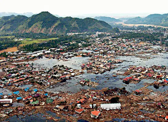 Flooded homes along the coast of Thailand immediately after the December 2004 tsunami.