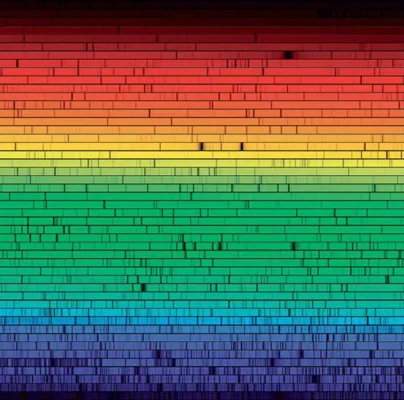 A sequence of high-resolution visible-light spectra of the Sun displaying Fraunhofer lines, captured at the McMath-Pierce Solar Facility at Kitt Peak National Observatory in Arizona. The wavelengths progress from the bottom to the top in each row, with violet at the bottom and red at the top.